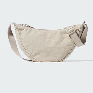 Uniqlo round shoulder bag In beige
